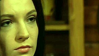 These naughty naked lesbian slaves are bound and punished, showing off big boobs and shaved pussies.