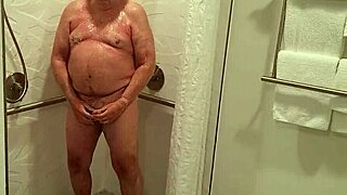 Grandpa's getting all steamy in the shower, showing off that mature exhibitionist vibe 😏
