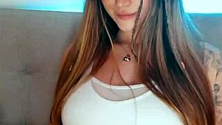 tattooed babe fingers herself crazy on webcam show