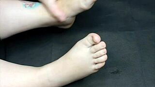 guy gives her a gentle foot massage with oil