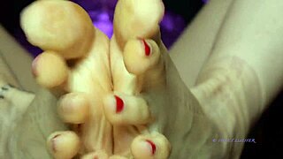sweat-drenched petite mistress's small feet with red toenail polish demand total domination