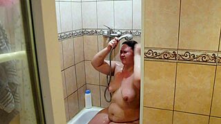 Home Cam Captures Chubby Milf Shower Shave of Big Wet Pussy