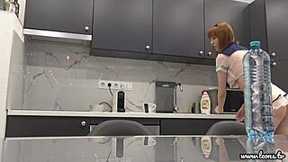 Tall Latvian redhead Lilly teases tight pussy ass tits in kitchen miniskirt