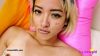 gorgeous petite asian milf model strips sexy body during daddy's photoshoot interview on sofa.