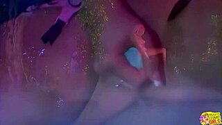 A blonde lesbian duo fingers wet pussies and straps on for banging