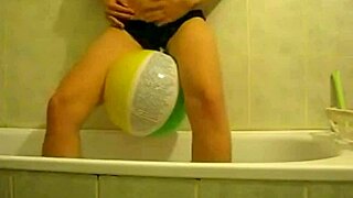 Sophie teases with balloons masturbating in living room then bathroom